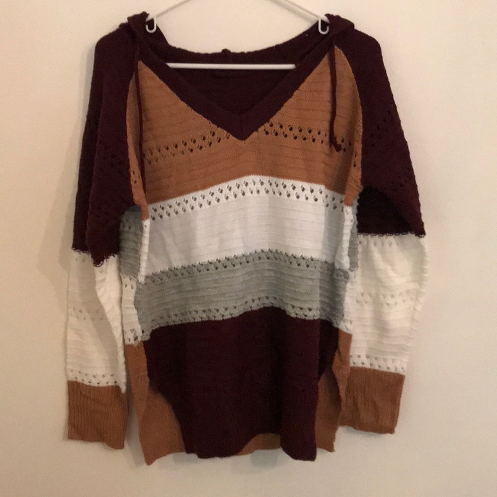 Multi-colored, striped hooded sweater